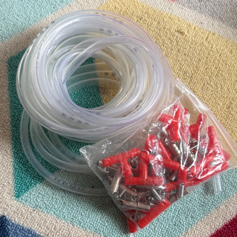 Rabbit watering system Clear Tubing with Red and Silver Connectors